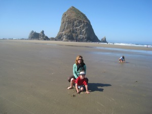 Haystack Rock is in the background as Paula and the boys play at Cannon Beach.