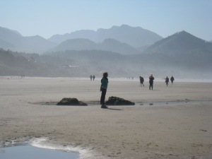 Taking it all in: Paula thinks deep thoughts as she enjoys the peaceful beauty of Cannon Beach.