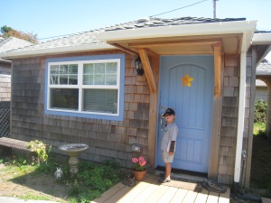 Jake models in front of our Cannon Beach cottage operated by Hidden Beach Villas.